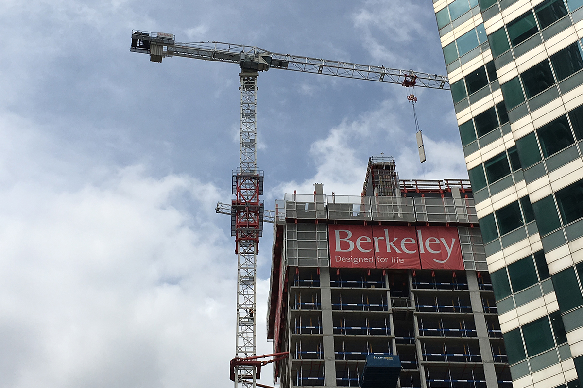 Berkeley banner on new build flats with crane in background 1 MIN Main
